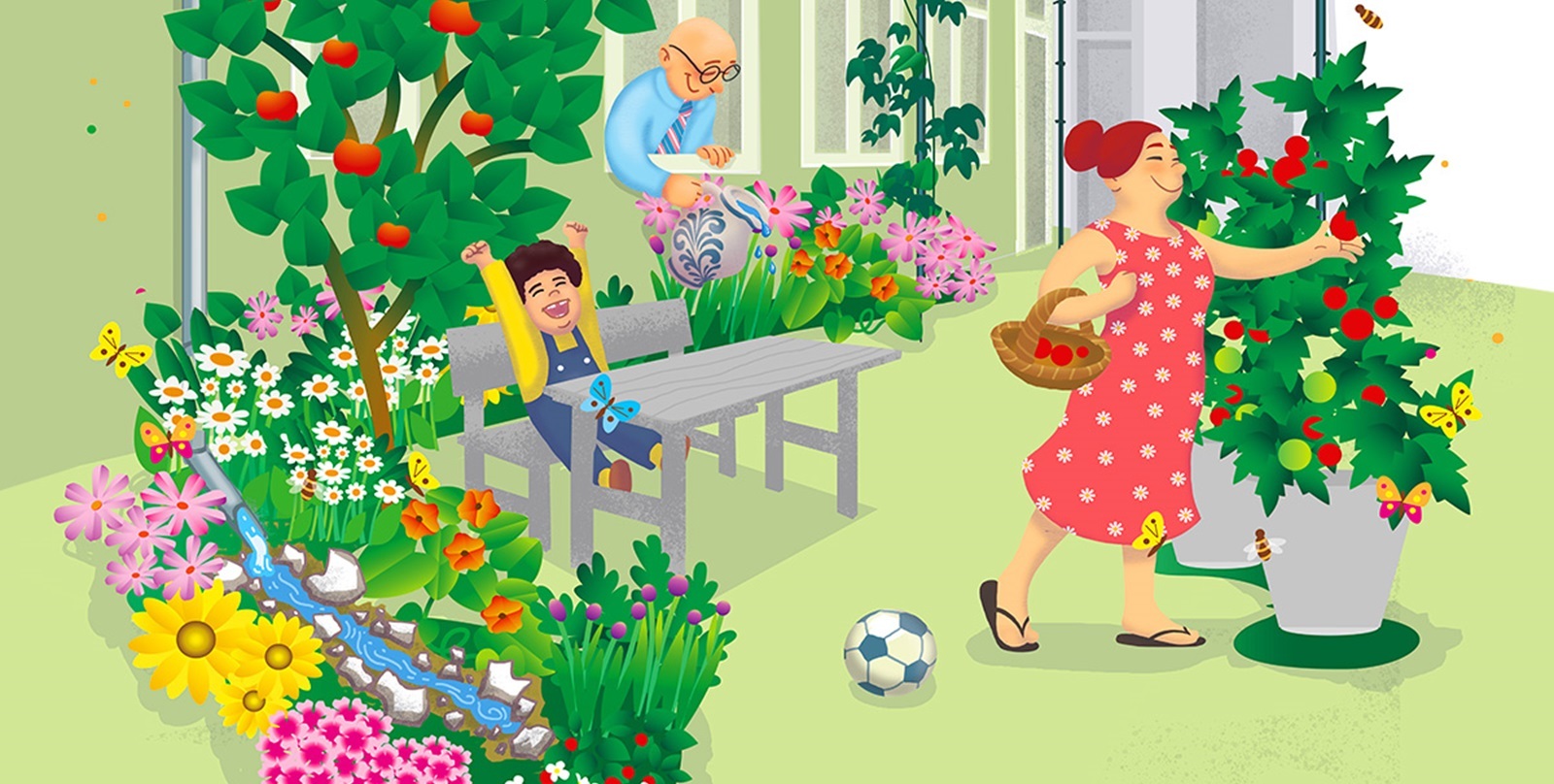 Familie im Garten mit vielen Blumen