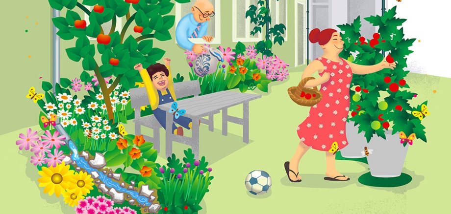 Familie im Garten mit vielen Blumen
