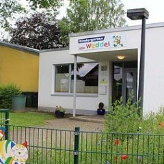 Foto des Eingangsbereichs der Kita Weddel